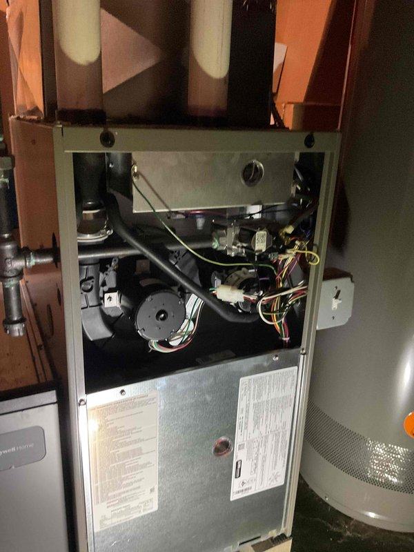 Performed scheduled maintenance inspection on 1-year-old HVAC system located in basement. Conducted comprehensive evaluation of furnace components including blower motor, electrical connections, and control board (with CIC module); documented system condition with interior panel photos. Inspected and verified proper operation of humidifier, thermostat, and hot water tank as part of the prepaid maintenance agreement.