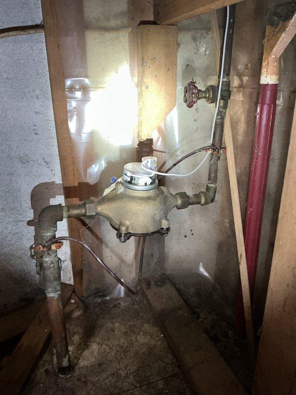 Responded to service call for intermittent operation of wall-mounted tankless water heater. Diagnosed issue by inspecting internal components including heat exchanger, circuit board, and ventilation assembly. Performed maintenance on flow sensor and cleaned scale buildup in water lines that was causing inconsistent operation. System now functioning properly with stable hot water delivery.