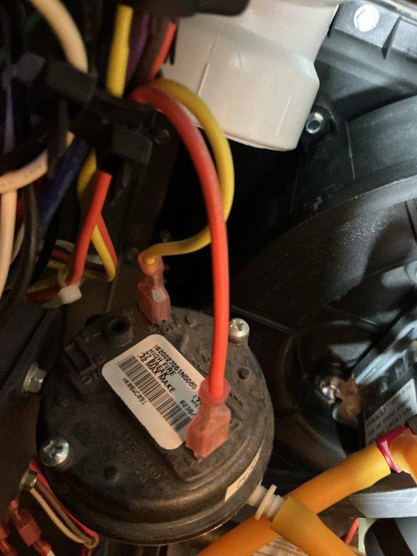 Diagnosed and identified faulty pressure switch in furnace system. Confirmed proper flame operation in combustion chamber after locating replacement part (PO: 1293245-001). Verified electrical connections to ensure proper system functionality.