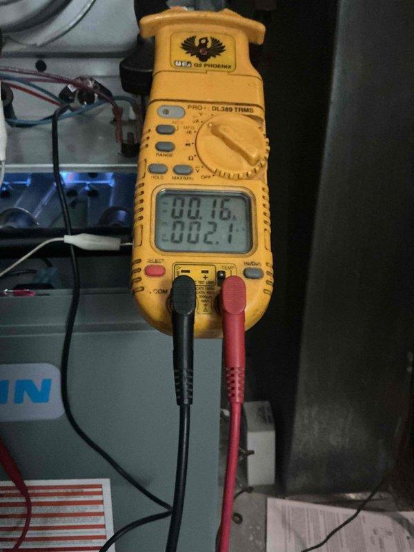 Responded to service call for one-year-old furnace with flashing red light that was still producing heat. Diagnostic testing with multimeter revealed condensation buildup on ductwork and minor electrical issues (0.16/2.1 readings). Inspected system components and resolved the warning indicator while confirming proper system operation.
