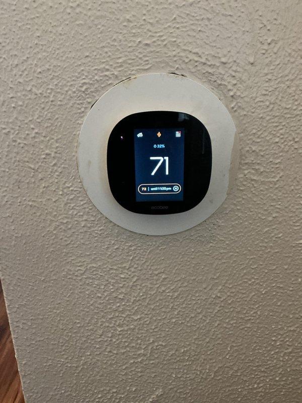 Completed Gold Furnace Inspection on a 3-year-old furnace located in the basement. System was operational with no issues identified; thermostat functioning properly at 71°F with 32% battery life remaining. Visual inspection of connected water heater and associated plumbing infrastructure revealed normal conditions with minor aging on water supply lines.