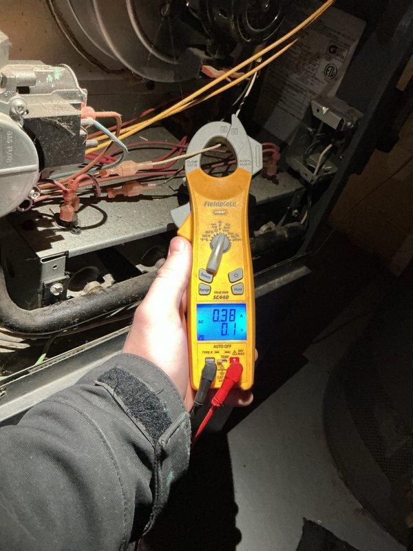 Responded to no-heat call for Goodman furnace under 10 years old located in basement. Diagnostic testing with Fieldpiece SC440 revealed faulty control board causing system failure to initiate. Replaced control board, verified proper amperage readings (0.38A), and confirmed complete system operation through multiple heating cycles.