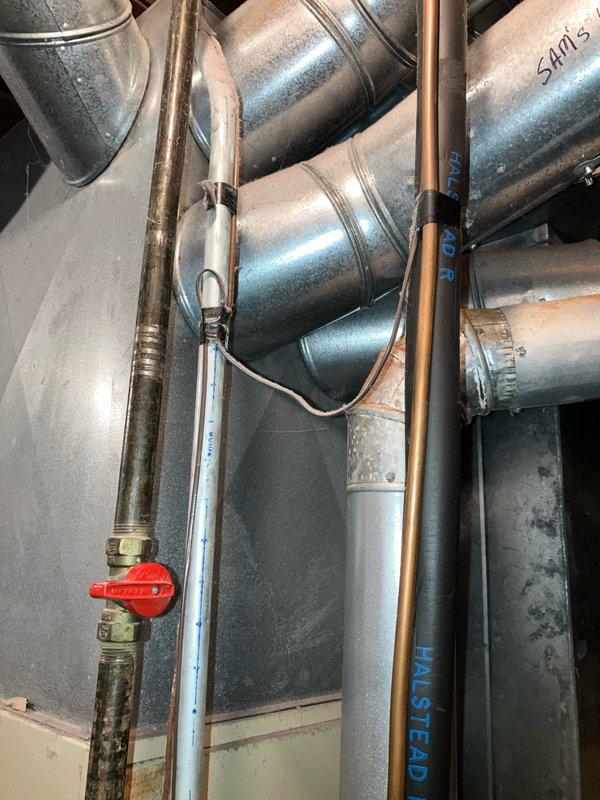 Conducted inspection of 30-year-old non-operational furnace with confirmed cracked heat exchanger on both sides. System requires full replacement of both furnace and AC units. Current installation includes outdated ductwork with multiple connection points that would benefit from modernization during equipment replacement.