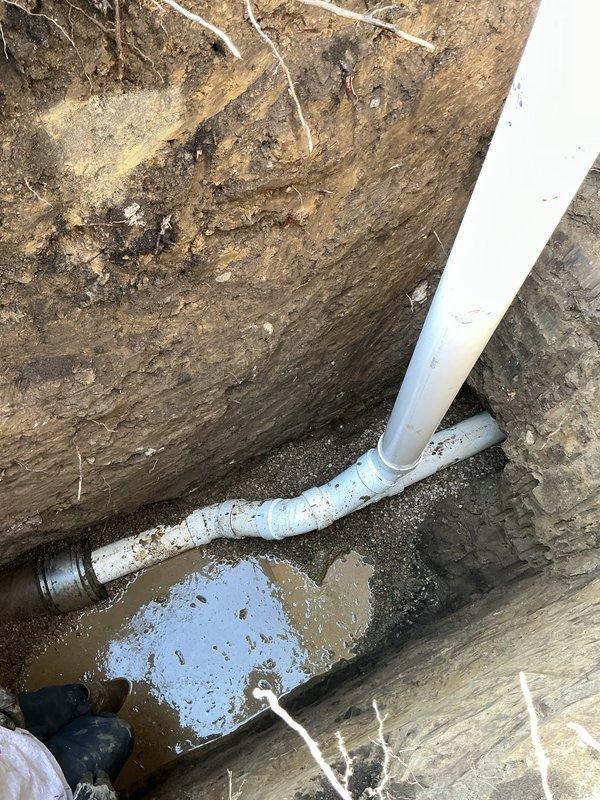 Completed excavation work for floor break repair as per estimate, exposing and addressing drainage pipe issues. Installed new PVC piping with proper elbow joint connections in the excavated area where standing water had accumulated. Miss Dig was contacted prior to excavation and all necessary documentation has been completed with customer approval.