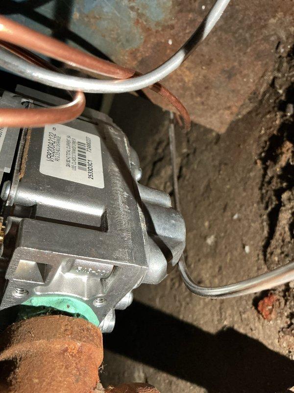 Diagnosed intermittent pilot light failure on residential furnace causing inconsistent heating. Performed voltage testing with multimeter at gas valve, confirming low millivolt reading of 16.4mV AC indicating thermocouple degradation. Replaced faulty thermocouple and verified proper pilot flame operation, restoring reliable heat production.