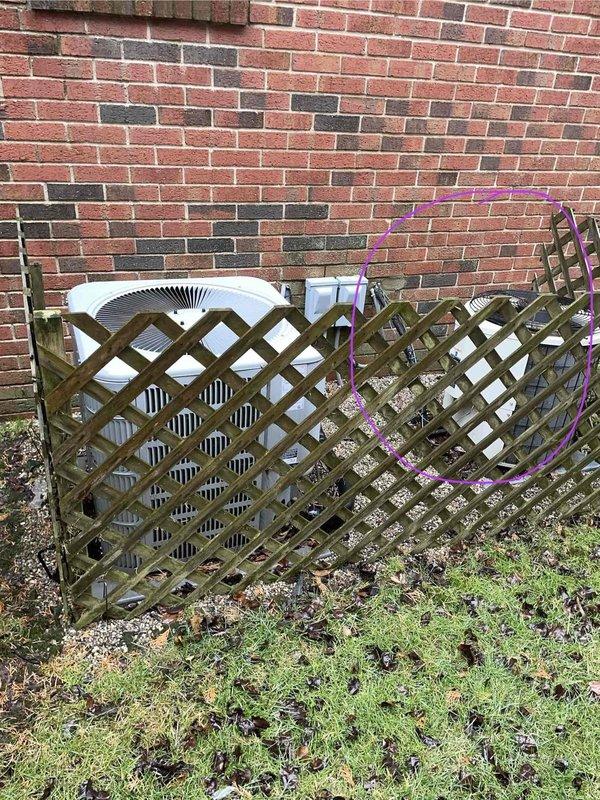 Conducted estimate for replacement of 25-year-old AC and furnace system in gated community residence. Current equipment is operational but at end of service life. Customer expressed preference for Lennox equipment. Visual inspection revealed outdoor units positioned against brick wall with protective lattice screening, requiring evaluation for proper clearance and airflow in new installation design.