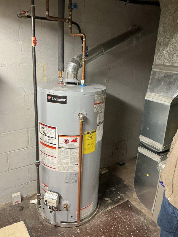 Performed routine maintenance flush on a 40-gallon Lochinvar residential water heater. Successfully removed sediment buildup to improve efficiency and extend unit life. System was fully tested after service with all components functioning properly; hot water delivery restored to optimal performance.