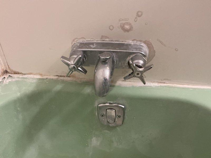 Performed leak repair service on second-floor bathtub faucet. Diagnosed and addressed deteriorated seals and worn valve components causing water seepage. Completed necessary repairs to eliminate the leak and prevent further water damage to surrounding wall structure.