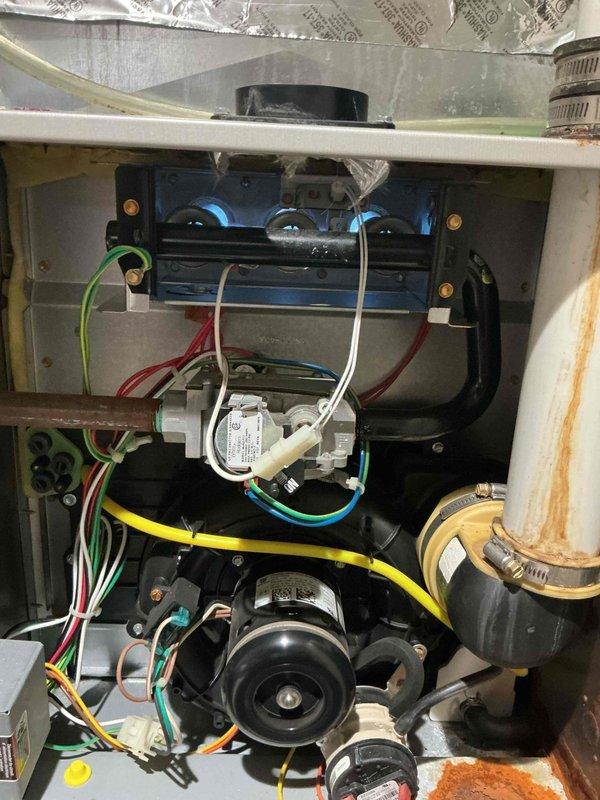 Responded to service call for 9-year-old furnace not maintaining temperature properly. Diagnostic testing revealed efficiency at 93.2% with combustion analyzer. Inspected and replaced faulty motherboard, resolving temperature regulation issues and restoring proper system function.