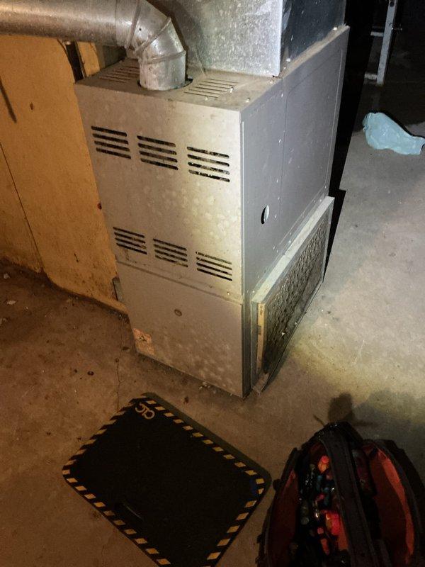Responded to no-heat call for 10+ year old furnace located in basement. Upon inspection, found significant dust accumulation and signs of age-related wear. Performed thorough cleaning of unit, replaced air filter, and tested system operation. Unit now functioning properly with restored airflow and heating capacity.