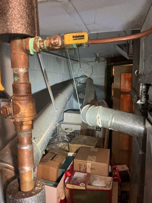 Responded to service call for 19-year-old Carrier furnace located in basement. Performed diagnostic inspection of heating system with focus on chimney liner, humidifier wire tubing, and venting connections. Identified oxidation at copper pipe joints and evaluated condition of ductwork and condensate drainage system. Provided customer with requested quote for chimney liner replacement, humidifier wire tubing repair, and vent pipe modifications.