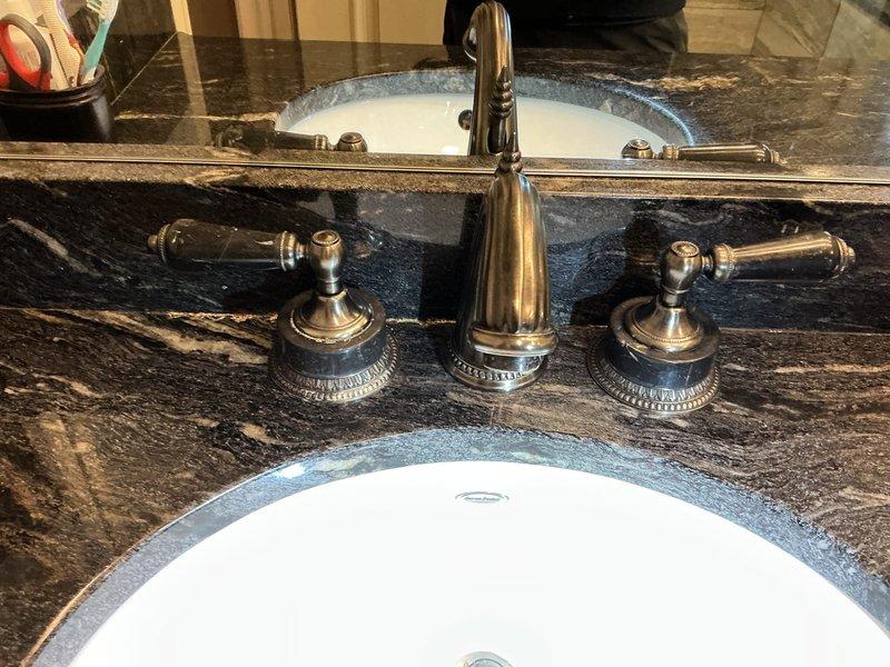 Responded to service call for no hot water from electric water heater and a faulty shower valve that would not turn off. Diagnosed and repaired the electric water heater to restore hot water functionality, and replaced the defective shower valve in the master bathroom to correct the continuous water flow issue.