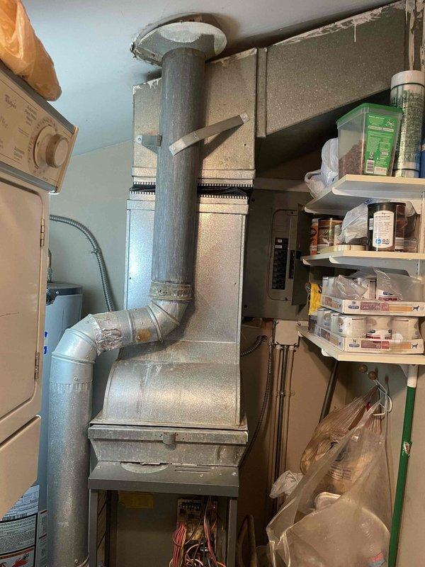 Conducted comprehensive assessment of 24-year-old furnace and AC system located in basement. Visual inspection confirmed customer's report of multiple issues, including suspected cracked heat exchanger. Documented existing installation configuration, including ductwork condition and electrical connections, to prepare detailed replacement estimate through Michigan Saves program as requested.