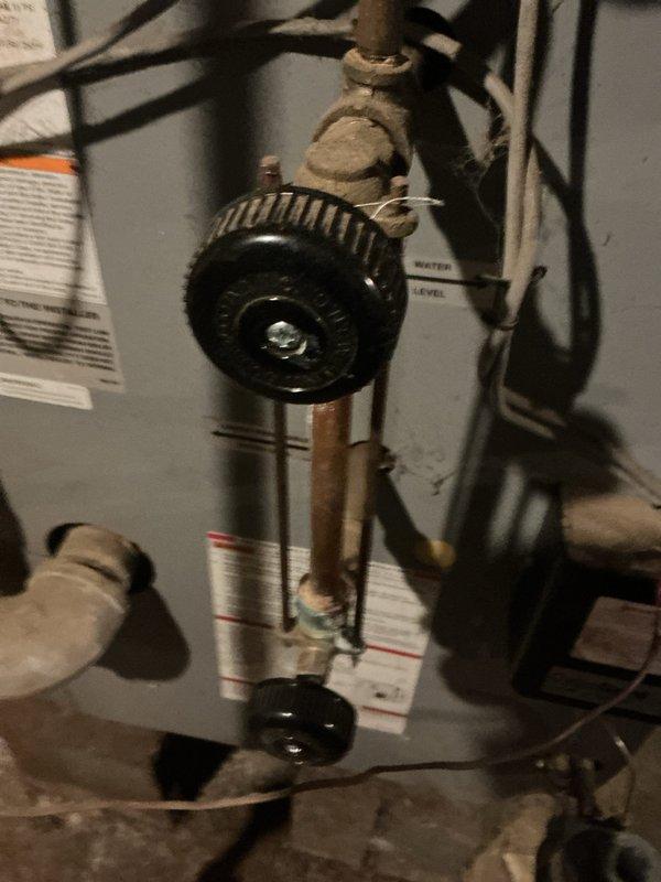 Responded to service call for furnace pilot failure on 4-5 year old basement unit. Inspected gas valve assembly and water level components, finding significant dust and debris accumulation affecting proper ignition. Cleaned affected components and restored pilot light functionality, ensuring proper system operation.