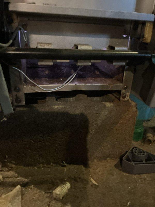 Responded to service call for furnace pilot failure on 4-5 year old basement unit. Inspected gas valve assembly and water level components, finding significant dust and debris accumulation affecting proper ignition. Cleaned affected components and restored pilot light functionality, ensuring proper system operation.