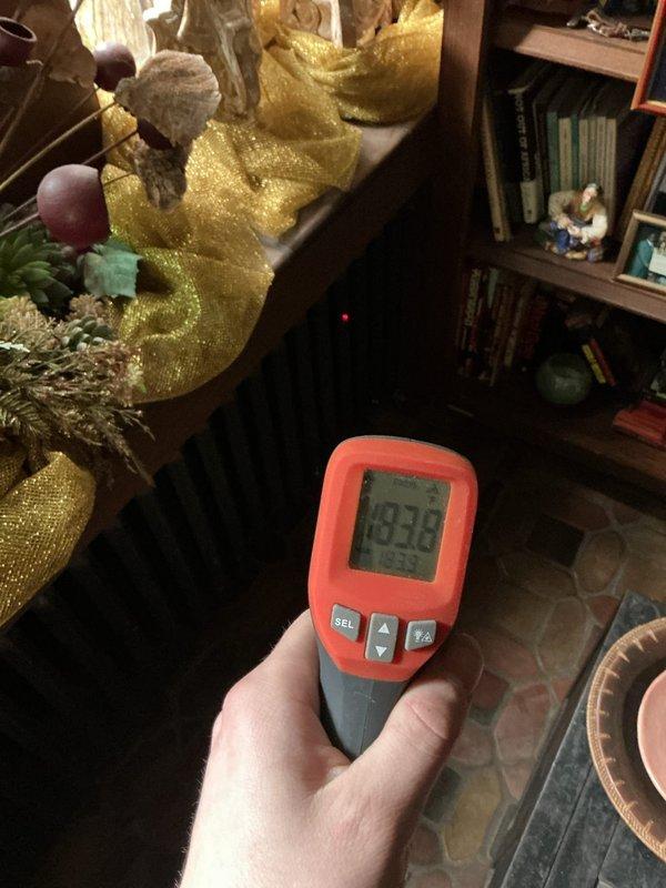 Responded to service call for no heat in office space while other areas maintained proper heating. Diagnostic testing revealed proper boiler operation with temperature readings of 176.7°F at supply lines. Ambient temperature readings showed 83.6°F, indicating the system was functioning correctly but distribution to the office zone was compromised. Located and cleared blockage in zone valve serving the office area, restoring proper heat flow to the affected space.