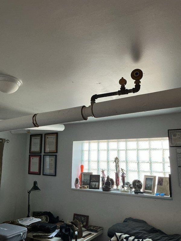 Conducted diagnostic assessment for potential radiator installation in basement and ceiling areas. Evaluated existing plumbing infrastructure including horizontal piping with brass fittings and valves. Documented current ventilation systems and space constraints to provide comprehensive estimate for customer-provided radiators.