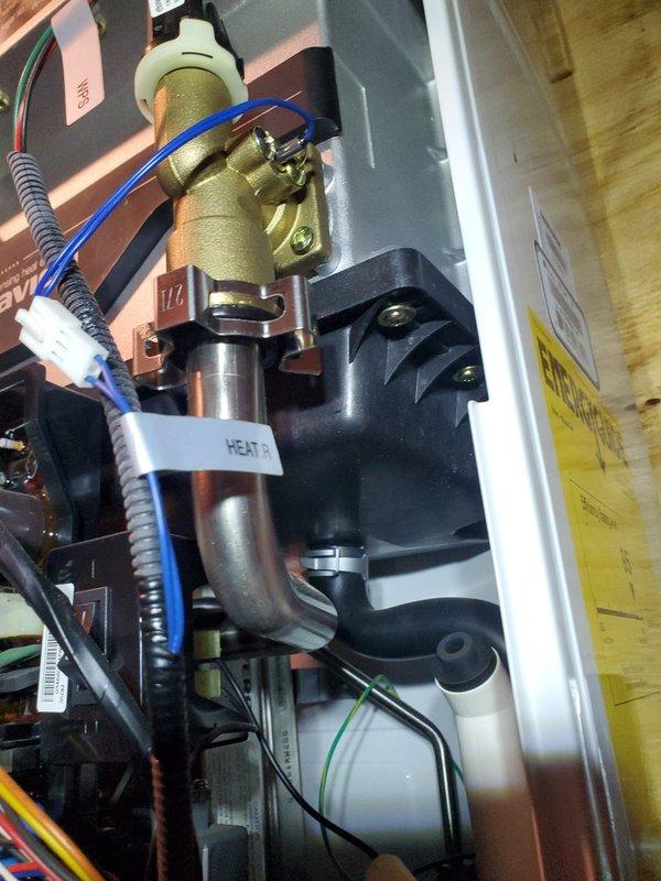 Diagnosed non-functioning baseboard heating system on 5-year-old boiler unit located in utility closet. Inspected heat exchanger connections, pressure regulator valve, and associated copper piping. Identified and repaired faulty electrical connections to restore proper heating function.