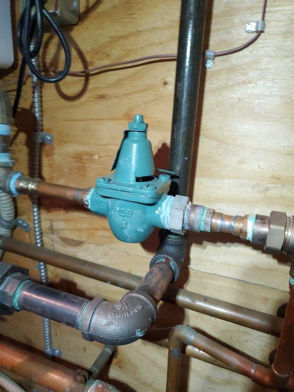 Diagnosed non-functioning baseboard heating system on 5-year-old boiler unit located in utility closet. Inspected heat exchanger connections, pressure regulator valve, and associated copper piping. Identified and repaired faulty electrical connections to restore proper heating function.