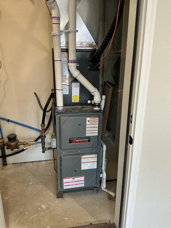 Successfully installed large humidifier and upgraded system with new digital thermostat after reviewing options with customer. Installation included proper connection to existing Amana furnace and integration with water supply system utilizing PEX piping and pressure regulation components.