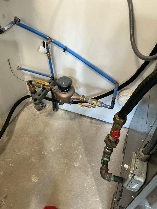 Successfully installed large humidifier and upgraded system with new digital thermostat after reviewing options with customer. Installation included proper connection to existing Amana furnace and integration with water supply system utilizing PEX piping and pressure regulation components.