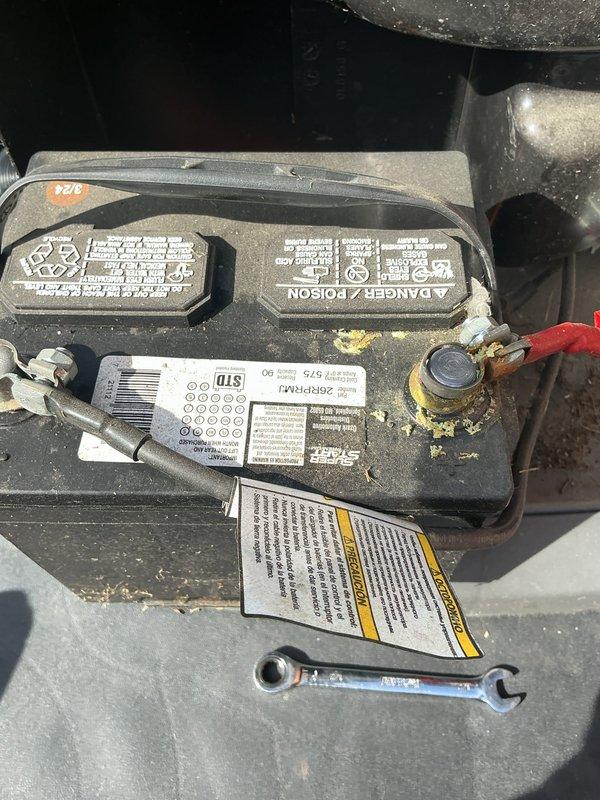 Performed diagnostic service on a 20KW Honeywell generator experiencing indicator light fluctuation between green and yellow. Inspected control panel indicators and battery connections. Battery showed signs of corrosion and insufficient voltage. Cleaned terminals and recommended battery replacement to resolve intermittent status light issues and ensure reliable emergency power operation.