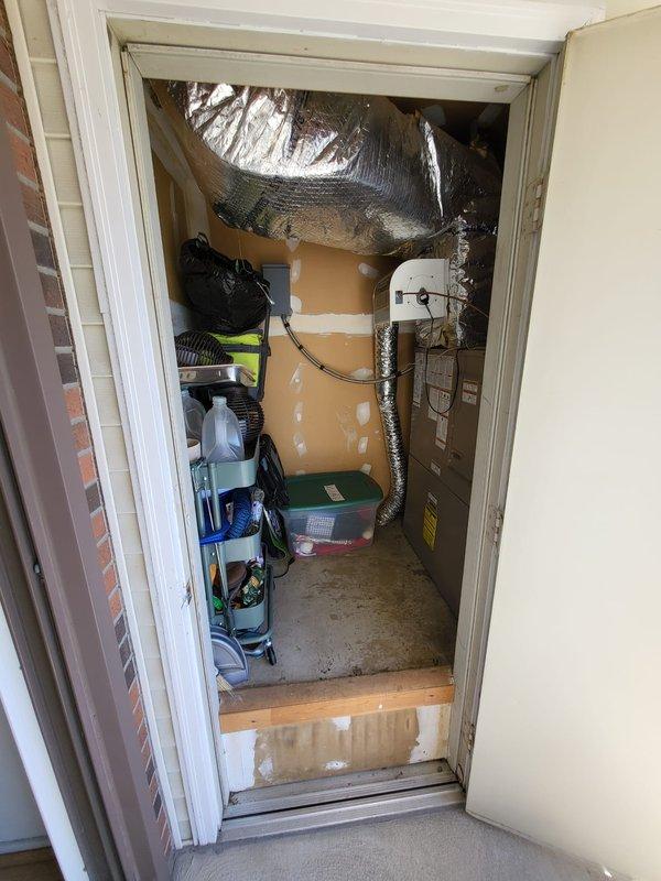 Performed comprehensive evaluation of existing HVAC system in utility closet, including inspection of aging furnace unit with attached ductwork and associated control components. Assessment included examination of installation configuration, available space constraints, and current ventilation setup to provide customer with accurate full system replacement estimate as requested for their second opinion.