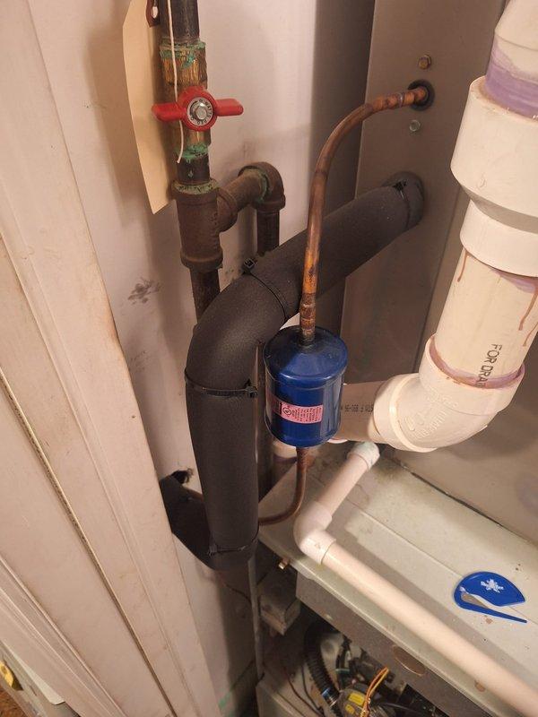 Completed installation of a 110,000 BTU furnace with all necessary mechanical and electrical connections. System included copper line upgrades with appropriate valving and insulated piping for thermal efficiency. Reconnected existing PVC drainage components and verified proper operation of all installed equipment.