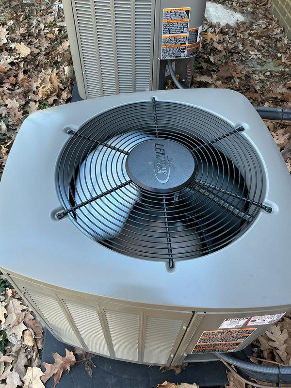 Performed AC start-up service on Lennox outdoor condensing unit. Inspected installation placement on concrete pad, verified proper electrical connections, and confirmed adequate clearance around unit for optimal airflow. System successfully started and operating within manufacturer specifications.