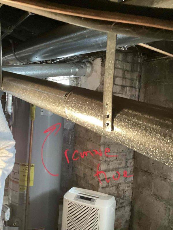 Inspected 30-year-old furnace in basement after customer reported burning smell and shut off unit as precaution. Diagnostic evaluation revealed cracked heat exchanger, which presents a safety hazard. Recommended complete replacement of the aging system with option to upgrade air conditioning simultaneously.