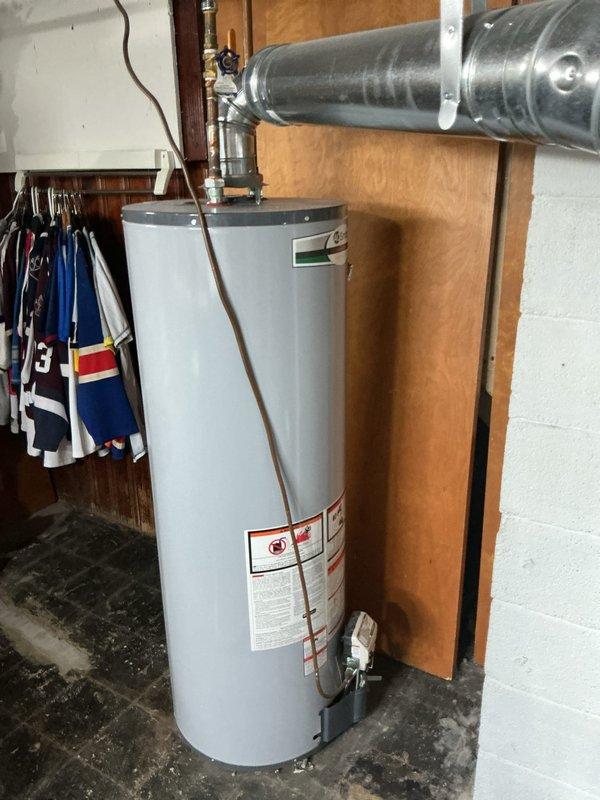 Performed maintenance flush on customer's tanked water heater to address reduced hot water capacity issue. Inspected unit (less than 5 years old), drained sediment buildup from tank, and checked all connections and valves for proper operation. Service restored optimal hot water volume and extended equipment lifespan.