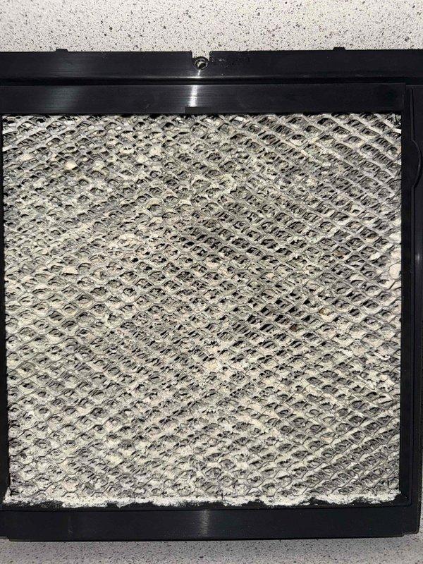 Performed diagnostic service on furnace that was reported to be cycling abnormally. Inspected Aprilaire humidifier system components and connections. Removed and examined air filter, which showed significant dust accumulation affecting system efficiency. Cleaned sensor components to address cycling issue, restoring normal operation sequence. System now heating properly with improved airflow.