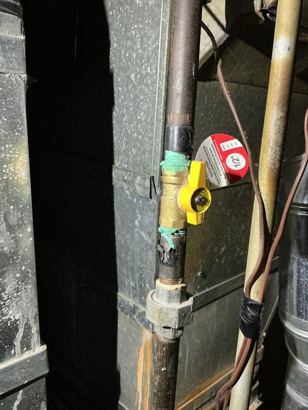 Performed comprehensive tune-up on 15-year-old furnace located in basement. Inspected control board functionality (verified normal operation with illuminated status LED and digital display), and examined gas valve assembly with particular attention to connections and seals. Completed standard maintenance checks on associated components including humidifier, thermostat, and hot water tank as requested.