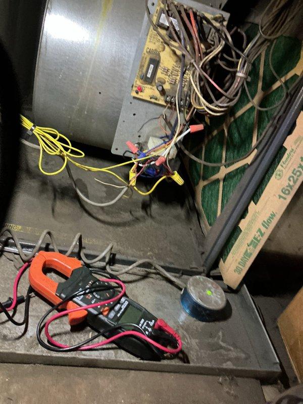 Responded to service call for blank thermostat issue on 20-year-old HVAC system. Performed electrical diagnostics using clamp meter to verify circuit integrity. Replaced non-functioning programmable thermostat after confirming proper voltage to control board and testing system operation.