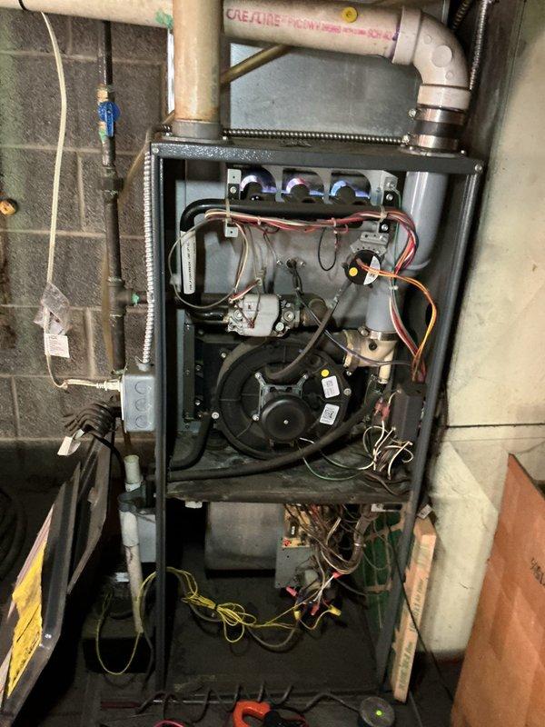 Responded to service call for blank thermostat issue on 20-year-old HVAC system. Performed electrical diagnostics using clamp meter to verify circuit integrity. Replaced non-functioning programmable thermostat after confirming proper voltage to control board and testing system operation.