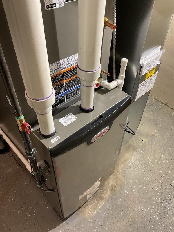 Successfully completed a two-day installation of a complete Lennox HVAC system, including a 90,000 BTU furnace, 3-ton air conditioner, S40 thermostat, and supplementary components (humidifier, APCO UV air purifier, and condensate pump). System features proper PVC venting with intake/exhaust pipes and includes a chimney liner installation. All ductwork connections were properly sealed and the system was fully tested for optimal performance.