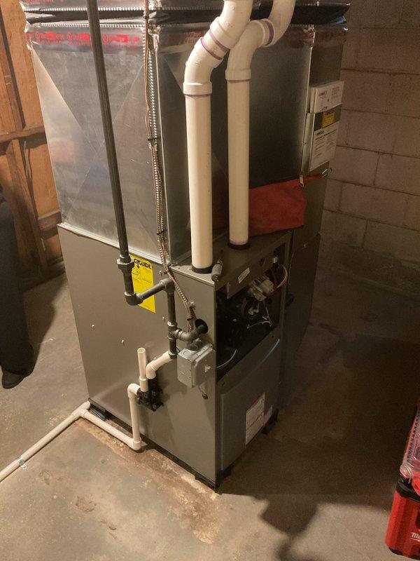 Successfully installed a 70,000 BTU furnace with humidifier, liner, and dual PVC venting system. Completed all mechanical and electrical connections, including proper condensate drainage setup. System was fully tested and is operating within manufacturer specifications.