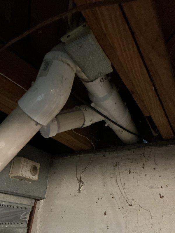 Performed inspection of existing natural gas furnace system in basement, which is over 10 years old but currently operational. Documented current installation configuration including ductwork, PVC venting/drainage pipes, and connection points. Provided replacement estimate for aging furnace system with detailed documentation of existing plumbing infrastructure and electrical connections necessary for proper equipment installation.