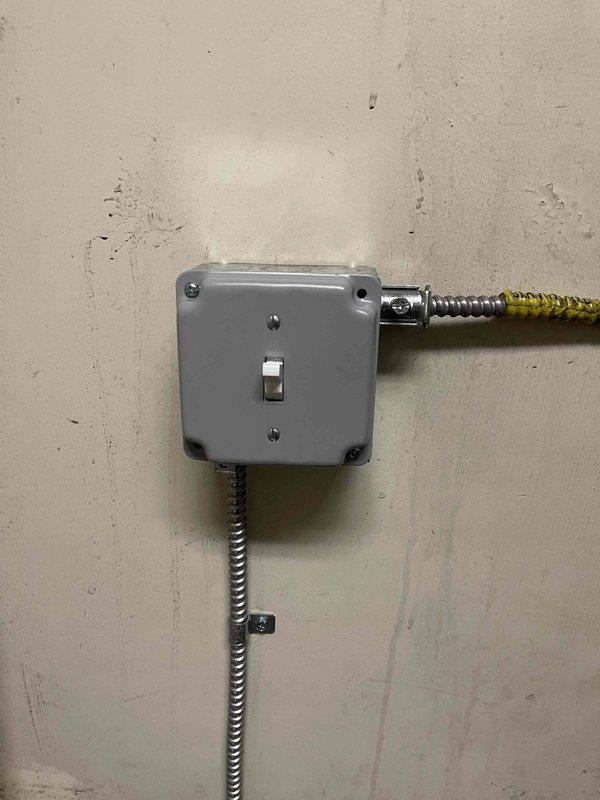 Successfully reconnected commercial tanked water heater in utility area, including installation of proper copper piping configuration with appropriate fittings. Verified electrical connections at junction box with toggle switch and ensured system was operational with all connections secure.