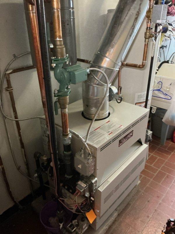 Responded to service call for a slow water leak in a boiler system under warranty. Upon inspection of the copper pipe connections in the basement, identified improper sealing at joint fittings. Repaired the faulty connection to eliminate the leak and verified proper system pressure and operation before completing service.