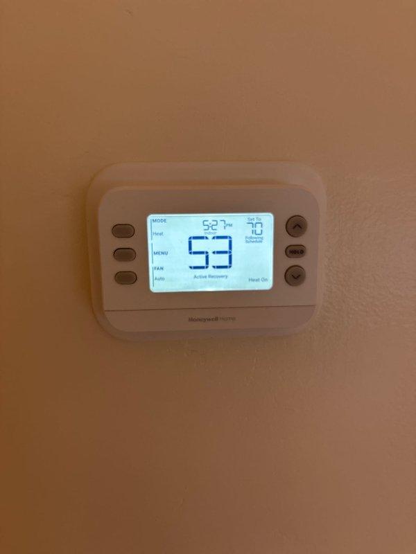 Completed installation of a complete HVAC system including a 70,000 BTU furnace, 2.5 TON AC unit, condensate pump, and Honeywell HOME digital programmable thermostat. System was properly connected to existing ductwork with all mechanical and electrical components installed according to code requirements, and necessary permits were obtained for the installation.