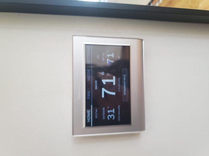 Performed routine safety inspection and tune-up on furnace and water heater in basement. Checked thermostat functionality (confirmed operating at 71° with 31% humidity) and inspected water heater connections including copper piping. Both systems functioning properly; no issues identified during preventative maintenance service.