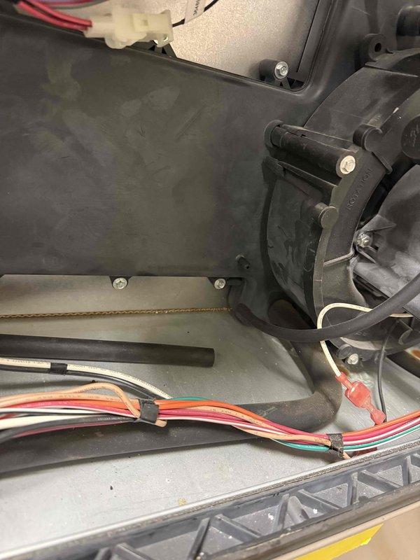 Responded to callback regarding furnace continuous operation after maintenance. Inspected three units located in attic, all over 10 years old. Discovered and repaired damaged electrical connector on control board, which was causing the continuous run issue. All furnaces now cycling properly and operating within normal parameters.