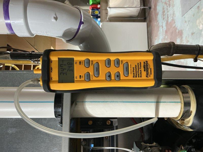 Performed comprehensive tune-up on 2017 HVAC system located in basement. Conducted diagnostic testing with Fieldpiece meter on system components, inspected humidifier, thermostat, and hot water tank. Verified proper venting of water heater and examined copper supply lines and PVC connections for optimal performance.