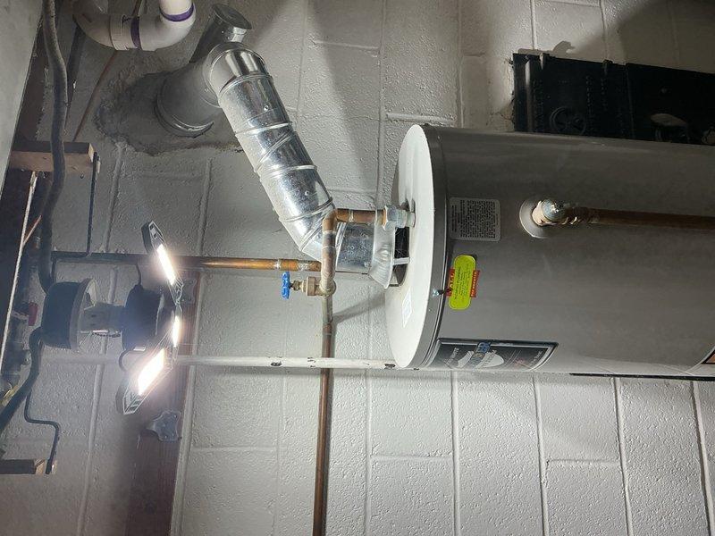 Performed comprehensive tune-up on 2017 HVAC system located in basement. Conducted diagnostic testing with Fieldpiece meter on system components, inspected humidifier, thermostat, and hot water tank. Verified proper venting of water heater and examined copper supply lines and PVC connections for optimal performance.