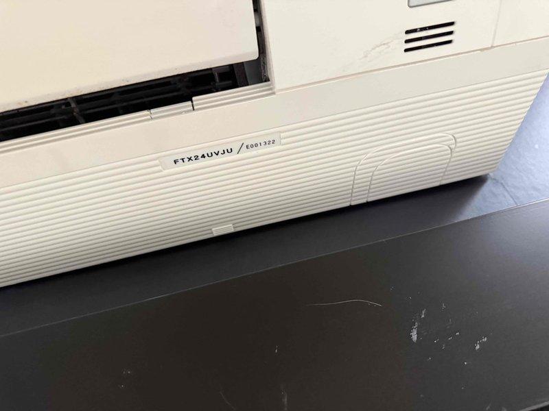 Performed diagnostic service on Daikin FTX24UVJU mini split system located in greenhouse. System was non-operational upon arrival. Investigation revealed refrigerant leak as indicated by fault code. Conducted comprehensive leak search on indoor head unit and associated line set running through building structure. System is approximately 4 years old and requires refrigerant recharge after leak repair.