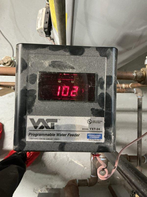 Diagnosed intermittent boiler shutdown issue by inspecting VAT Programmable Water Feeder (model VXT-24) and associated plumbing components. System was functioning at time of service with customer reporting ability to restart without difficulty after shutdowns. Verified proper operation of water level control system and checked all valves, connections, and piping for integrity with no visible leaks or damage observed.