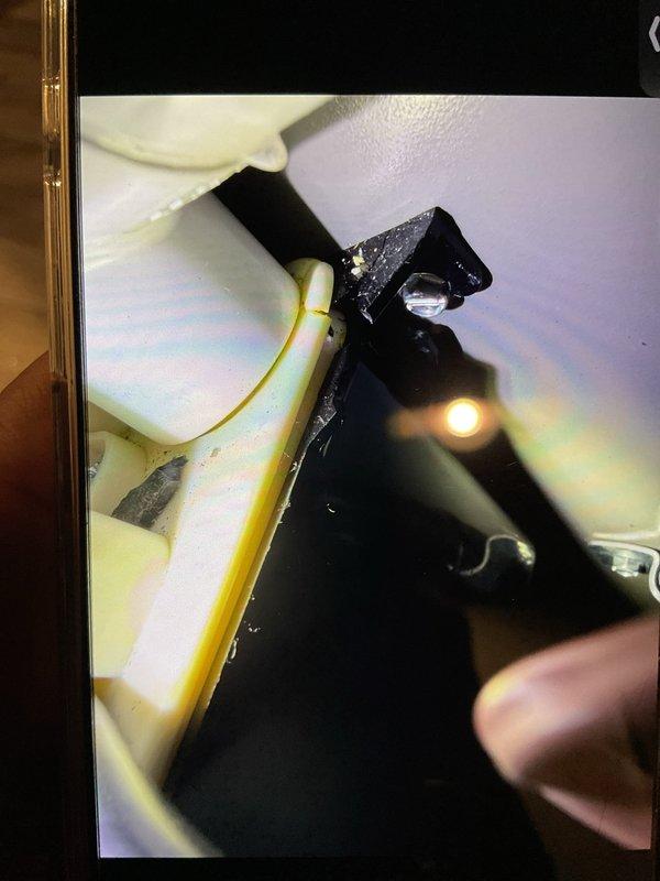 Performed tune-up service on heat pump system. Unclogged condensate pump hose that was causing drainage issue and replaced deteriorated discharge tubing. System now operating properly with restored condensate drainage.