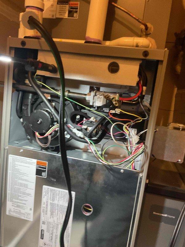 Completed routine NSP furnace inspection on a 2-year-old unit located in the garage. Performed comprehensive diagnostic check of all internal components including electrical connections, control boards, and ventilation system. Furnace is functioning properly with no issues identified.
