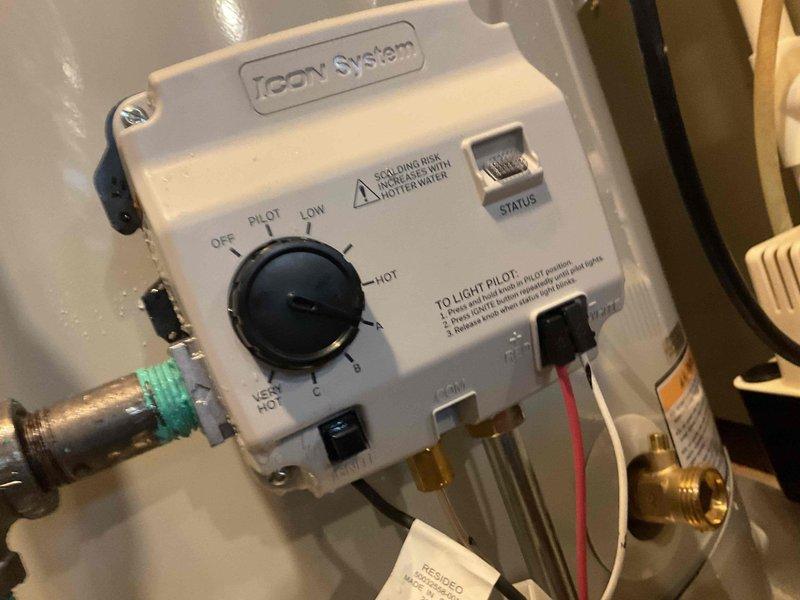 Completed installation of a 40-gallon Icon System water heater in basement location. Unit features temperature control panel with safety settings and pilot light system. Installation included proper connection to existing plumbing infrastructure and verification of proper operation alongside Bryant furnace system.